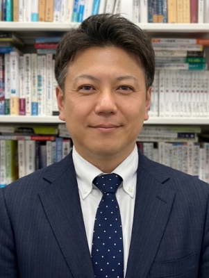 経営学科長